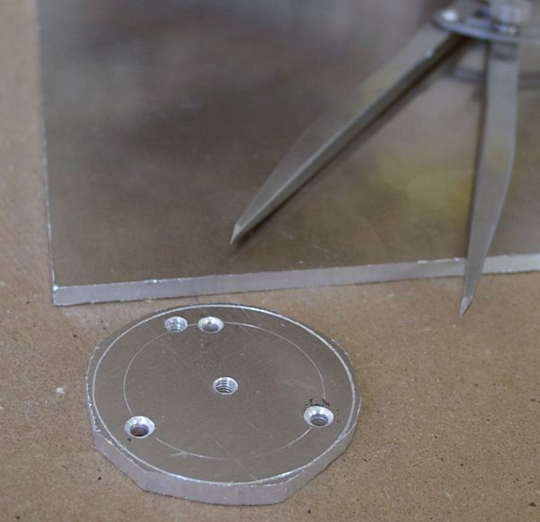 Aluminium disk as a base for the Fraen triple collimator and three Luxeon Star LEDs